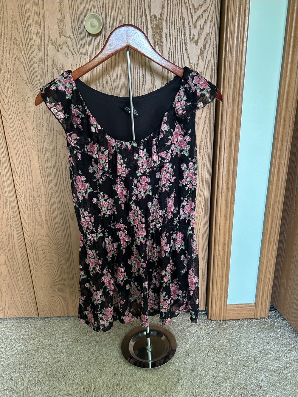 Vanity Black Sleeveless Lace Blouse with a Pink and Green Floral Pattern